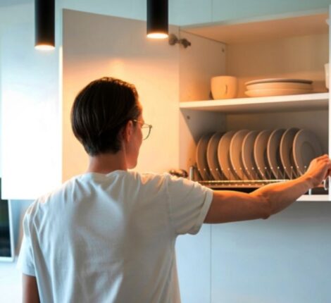 Modern kitchen remodeling in Fredericksburg, VA featuring custom white cabinets and large island